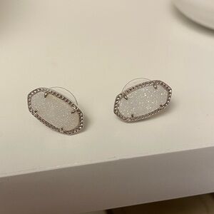 Kendra Scott stud earrings.